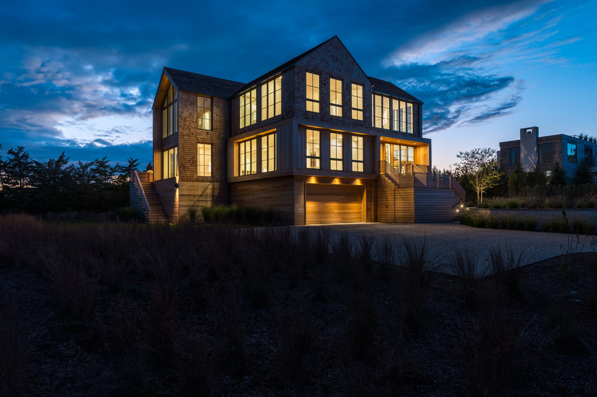 Residence lit from within at dusk