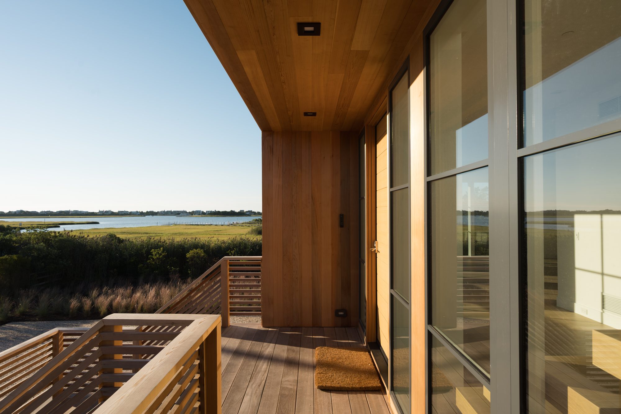 Covered cedar deck looking out to the bay